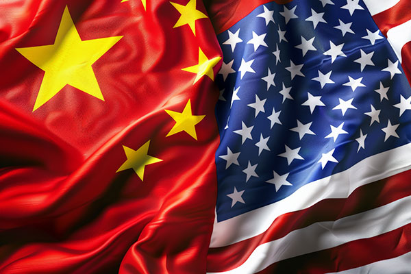 flags of the U.S. and China lying side by side.